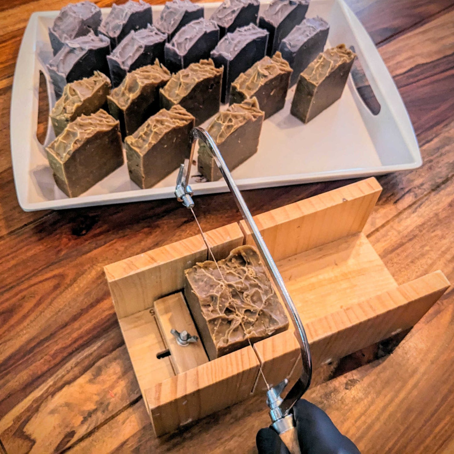 cutting all natural soap by hand