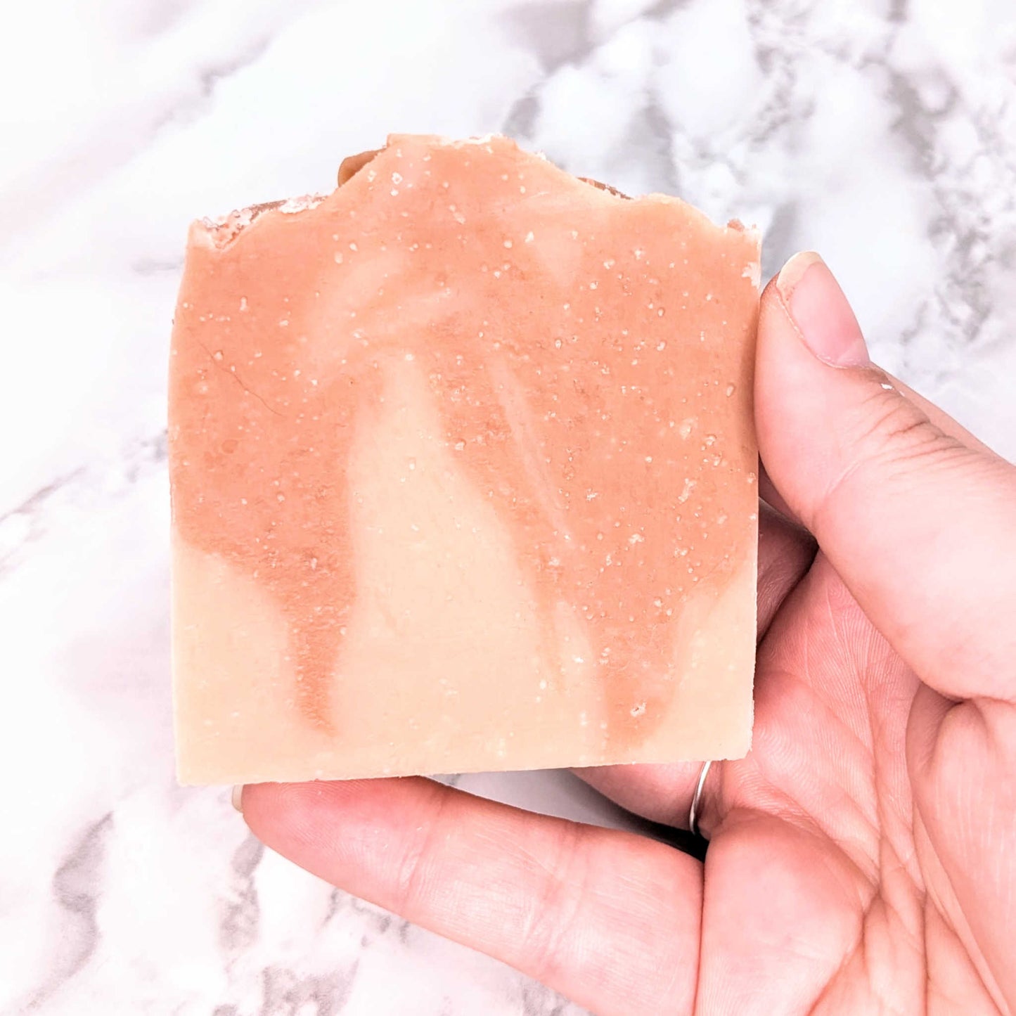 floral and Himalayan salt soap in hand