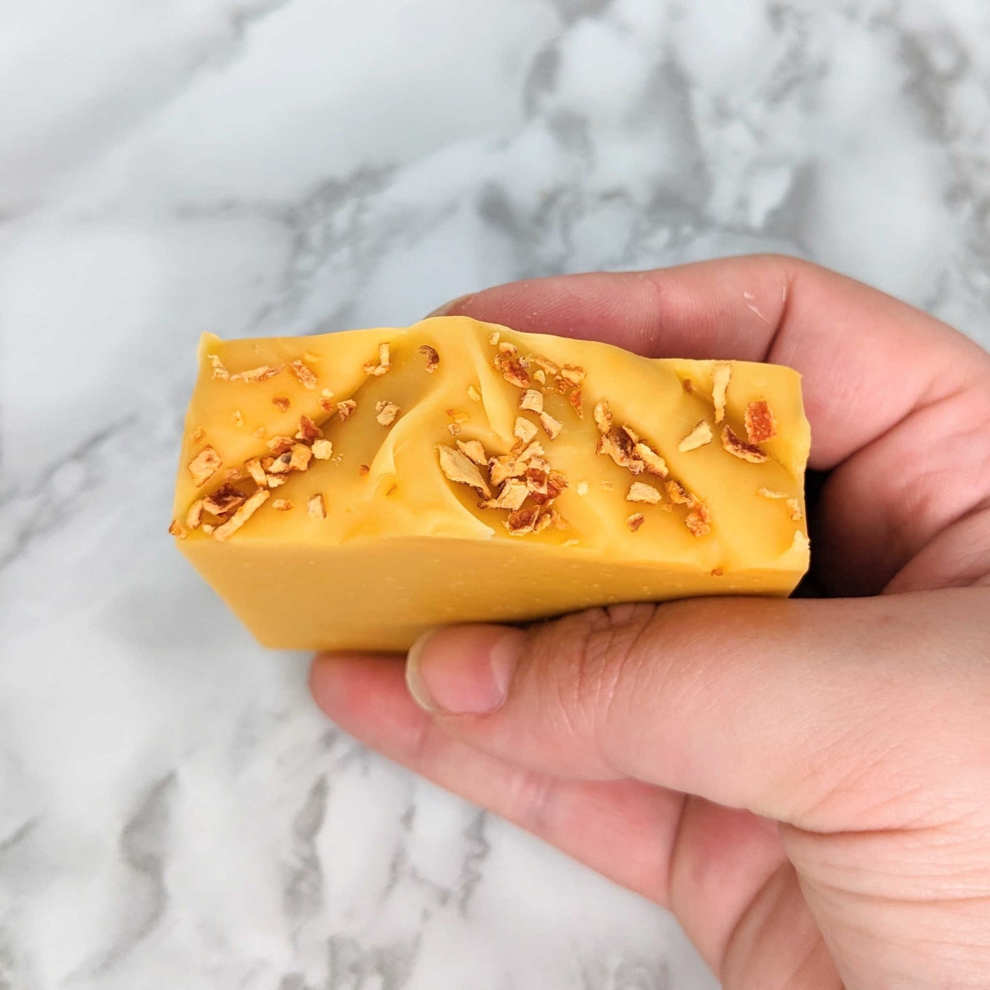 orange soap with peel on top